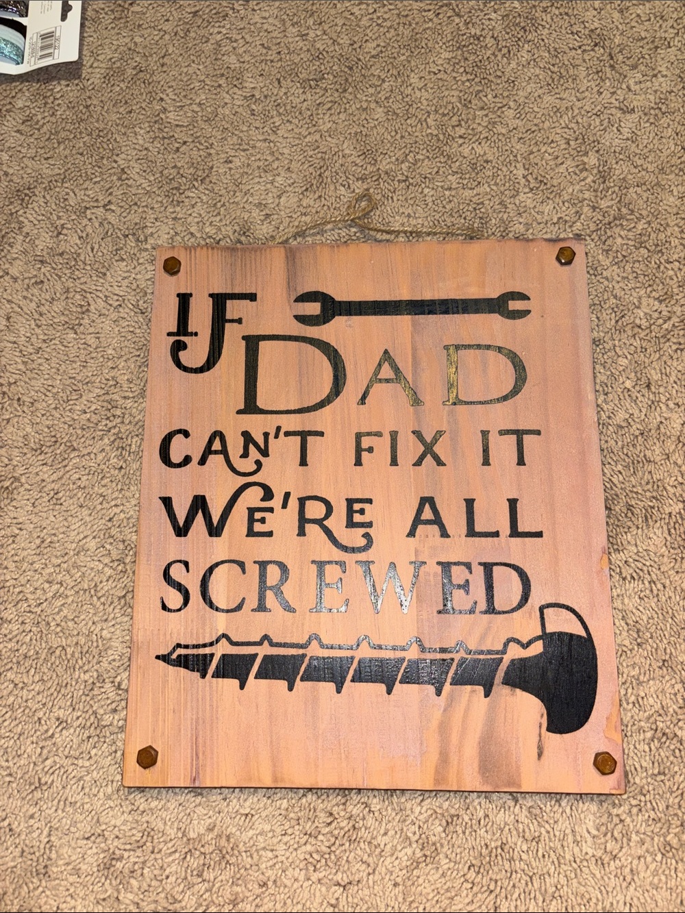 Source Unknown Pink Wood Sign with Black Lettering